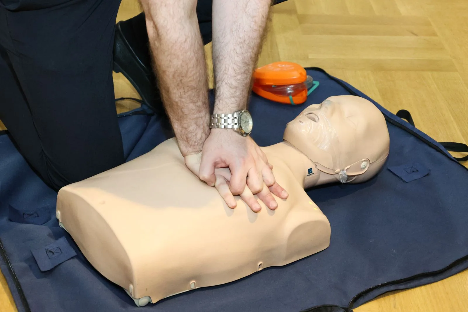 CPR training with a mannequin dummy indoors